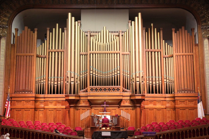 The colossal 1888 Roosevelt pipe organ at Denver’s Trinity United Methodist Church is “one of the monuments of organ building in the West,” said organist Norm Sutphin.